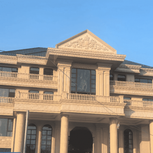 玉溪黄金麻别墅外墙干挂石材效果示例