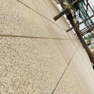 玉溪 黄金麻花岗岩荔枝面外墙干挂石材效果示例