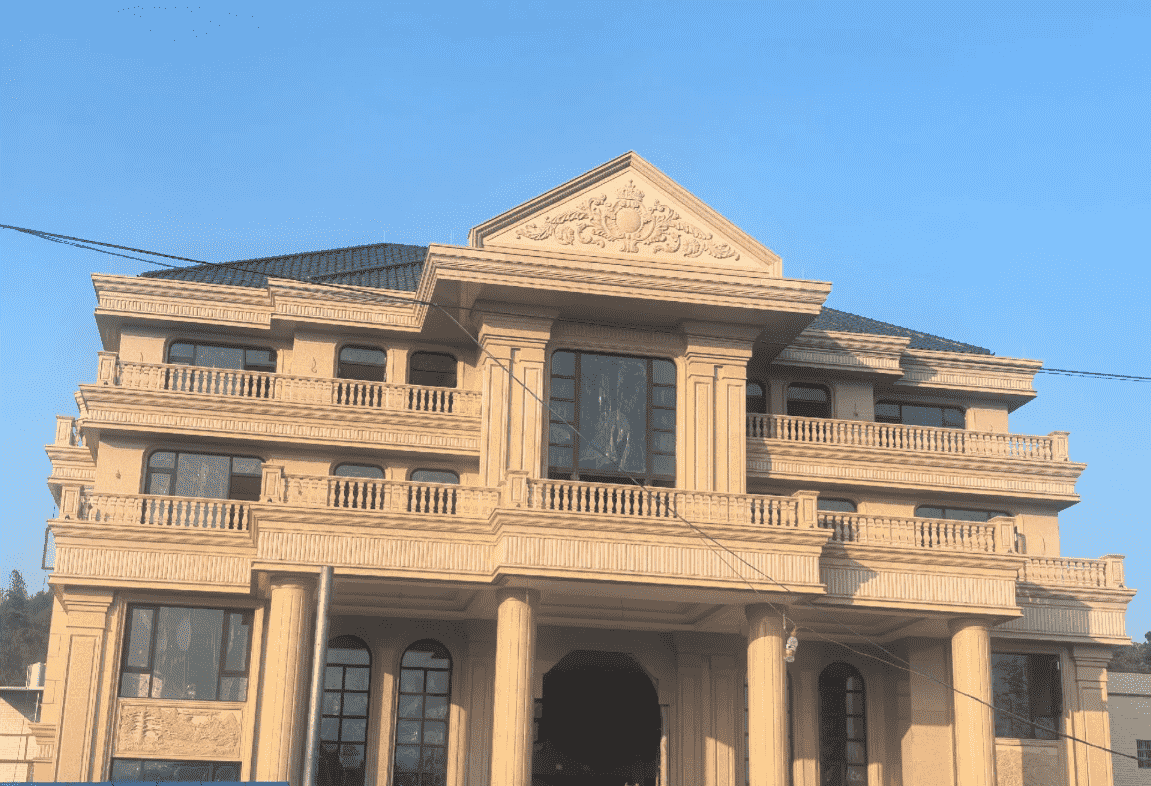 玉溪黄金麻别墅外墙干挂石材效果示例